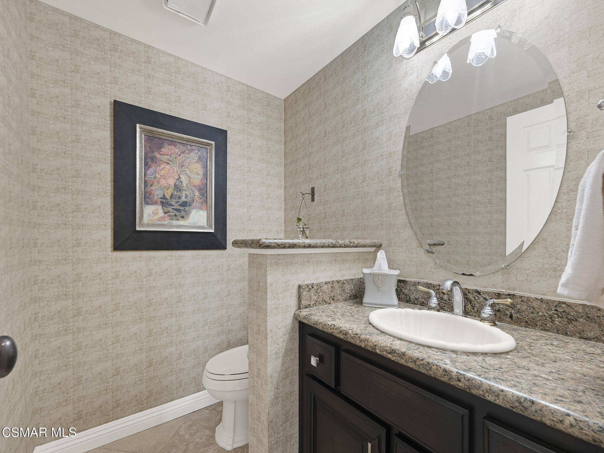 625 Sedgeworth Court Simi Valley, CA 93065 - Photo 19 of 44 a bathroom with a granite countertop sink a toilet and a mirror