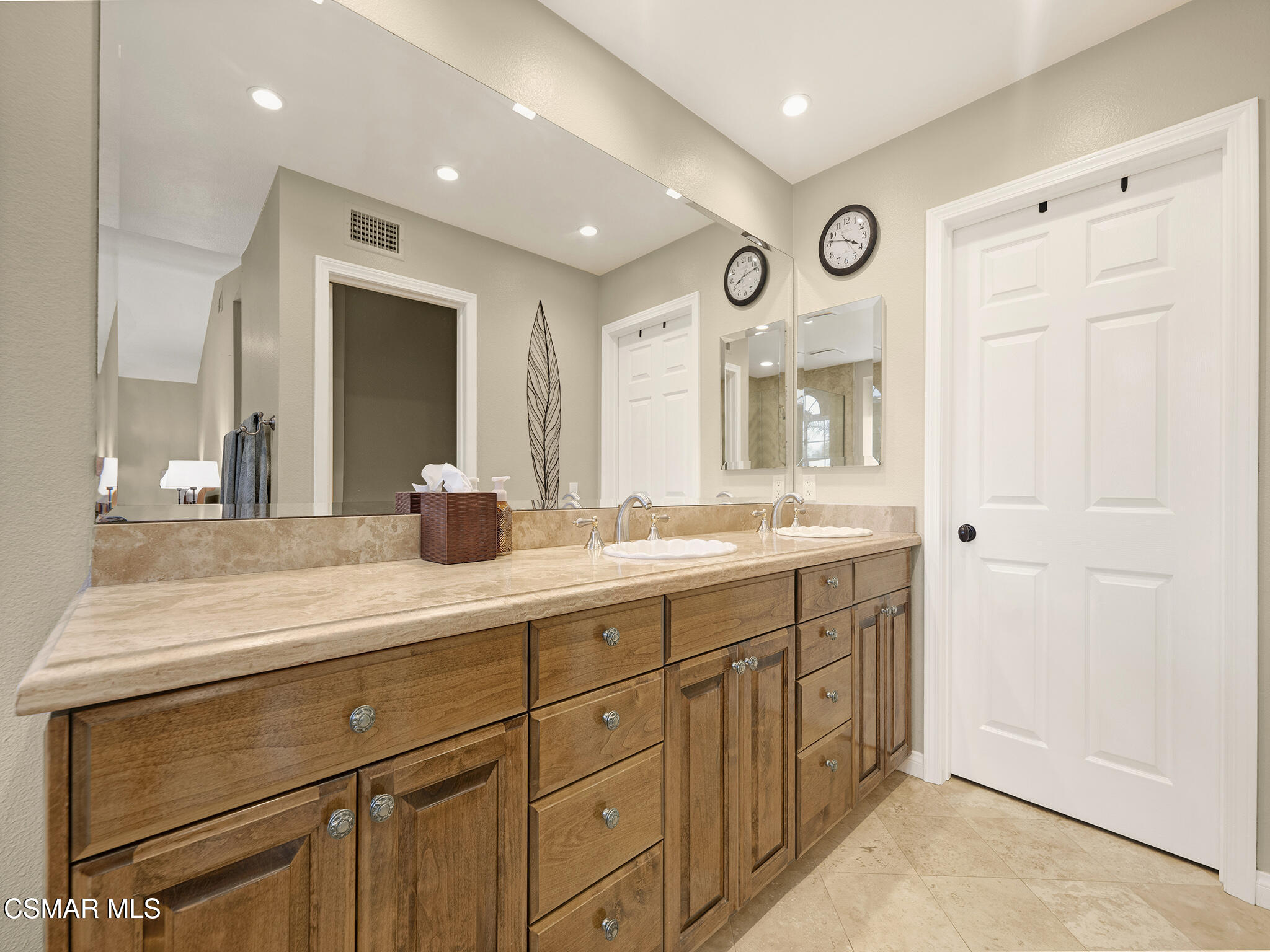 625 Sedgeworth Court Simi Valley, CA 93065 - Photo 26 of 44 a spacious bathroom with a double vanity sink and a mirror
