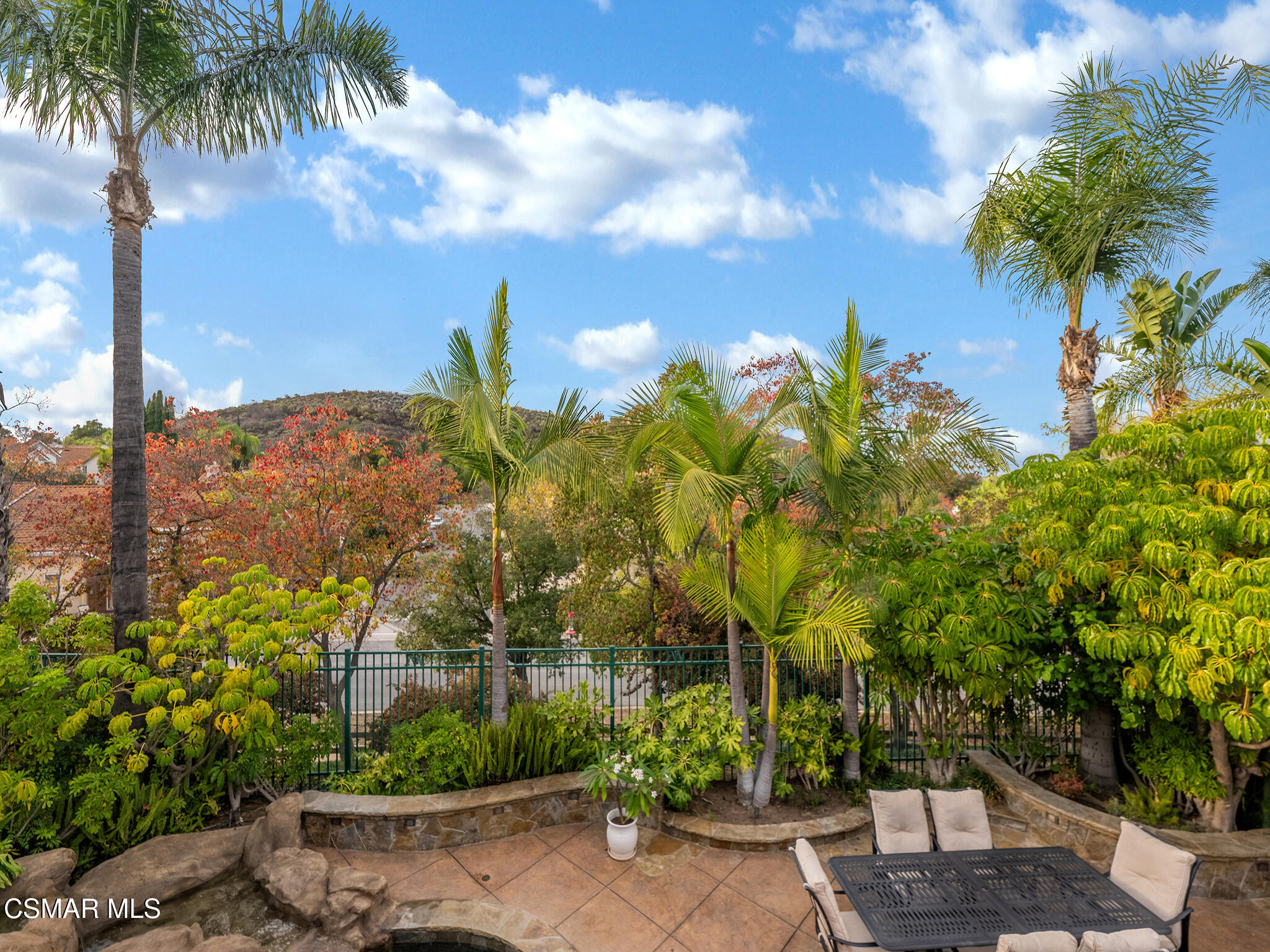 625 Sedgeworth Court Simi Valley, CA 93065 - Photo 35 of 44 a view of a garden with a building in the background