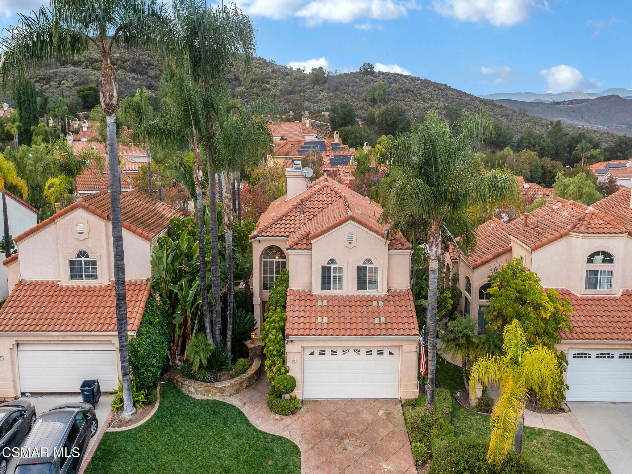 625 Sedgeworth Court Simi Valley, CA 93065 - Photo 40 of 44 a view of a house with a backyard and a garden