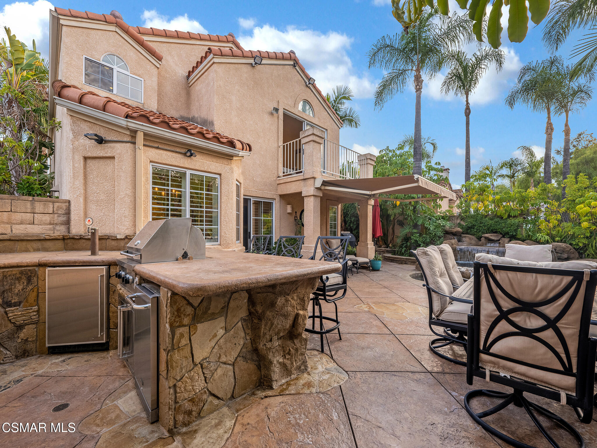 625 Sedgeworth Court Simi Valley, CA 93065 - Photo 42 of 44 a view of a patio with table and chairs and potted plants