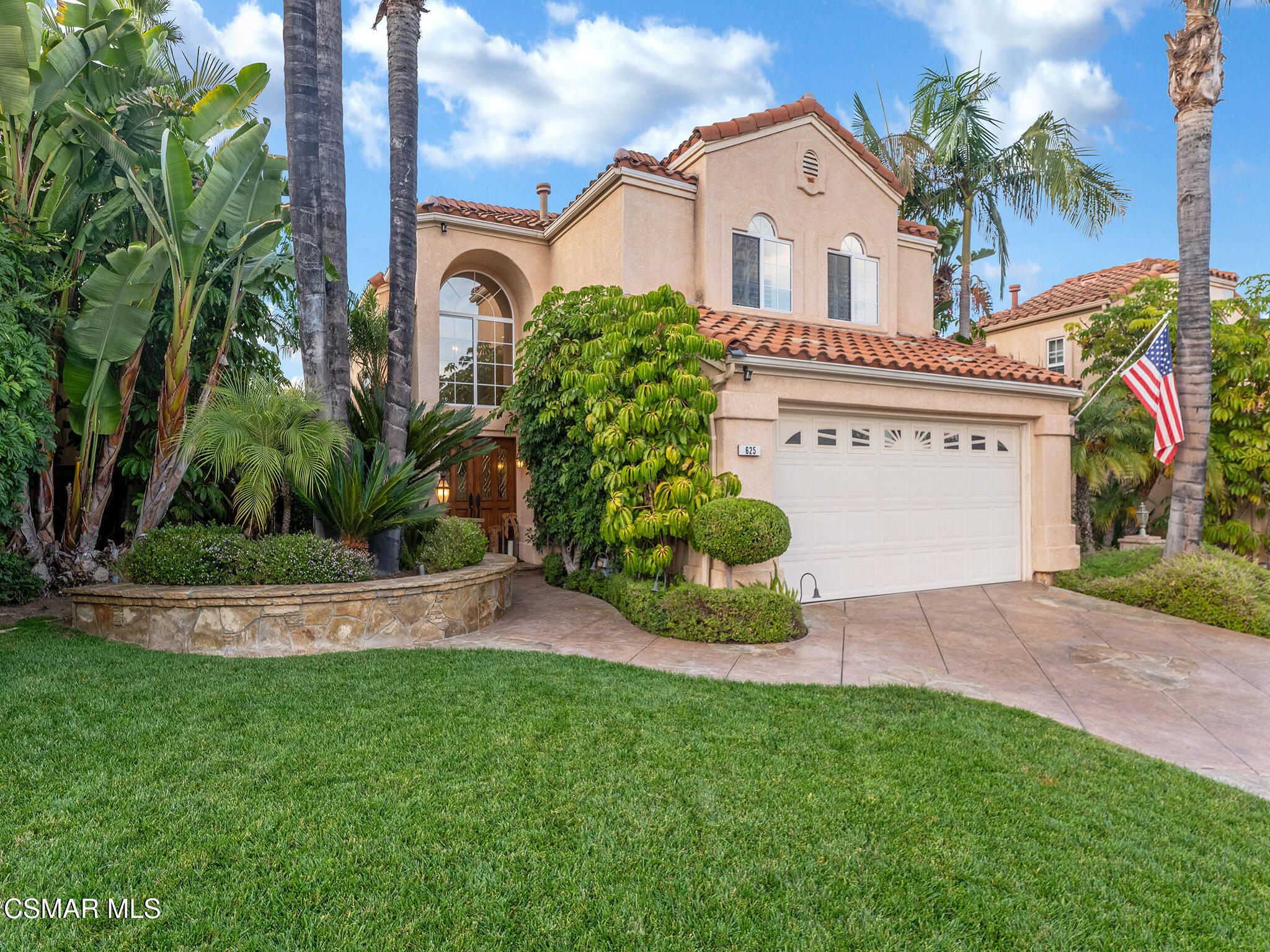 625 Sedgeworth Court Simi Valley, CA 93065 - Photo 44 of 44 a front view of a house with a garden and plants