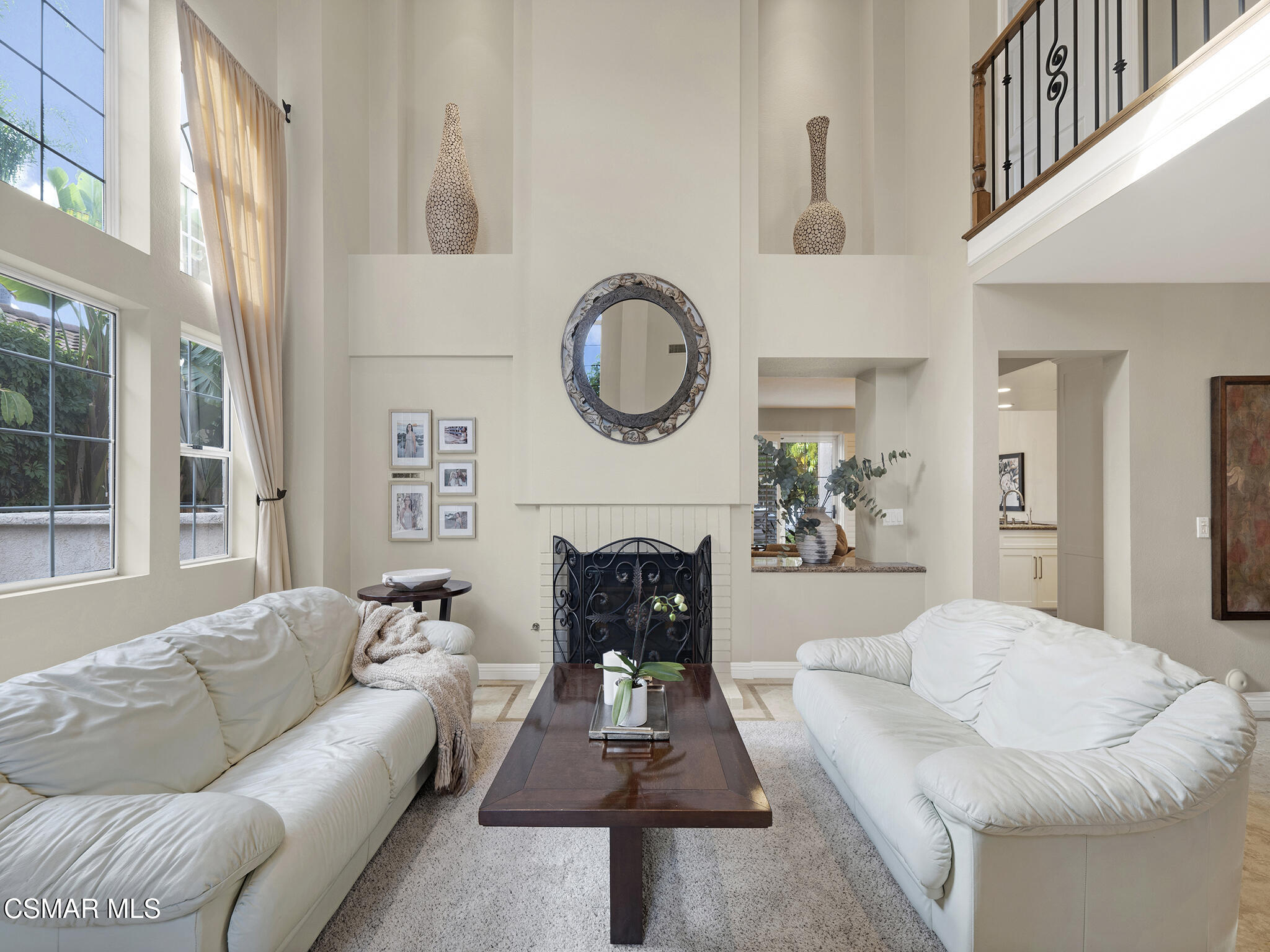 625 Sedgeworth Court Simi Valley, CA 93065 - Photo 6 of 44 a living room with furniture a fireplace and a large window