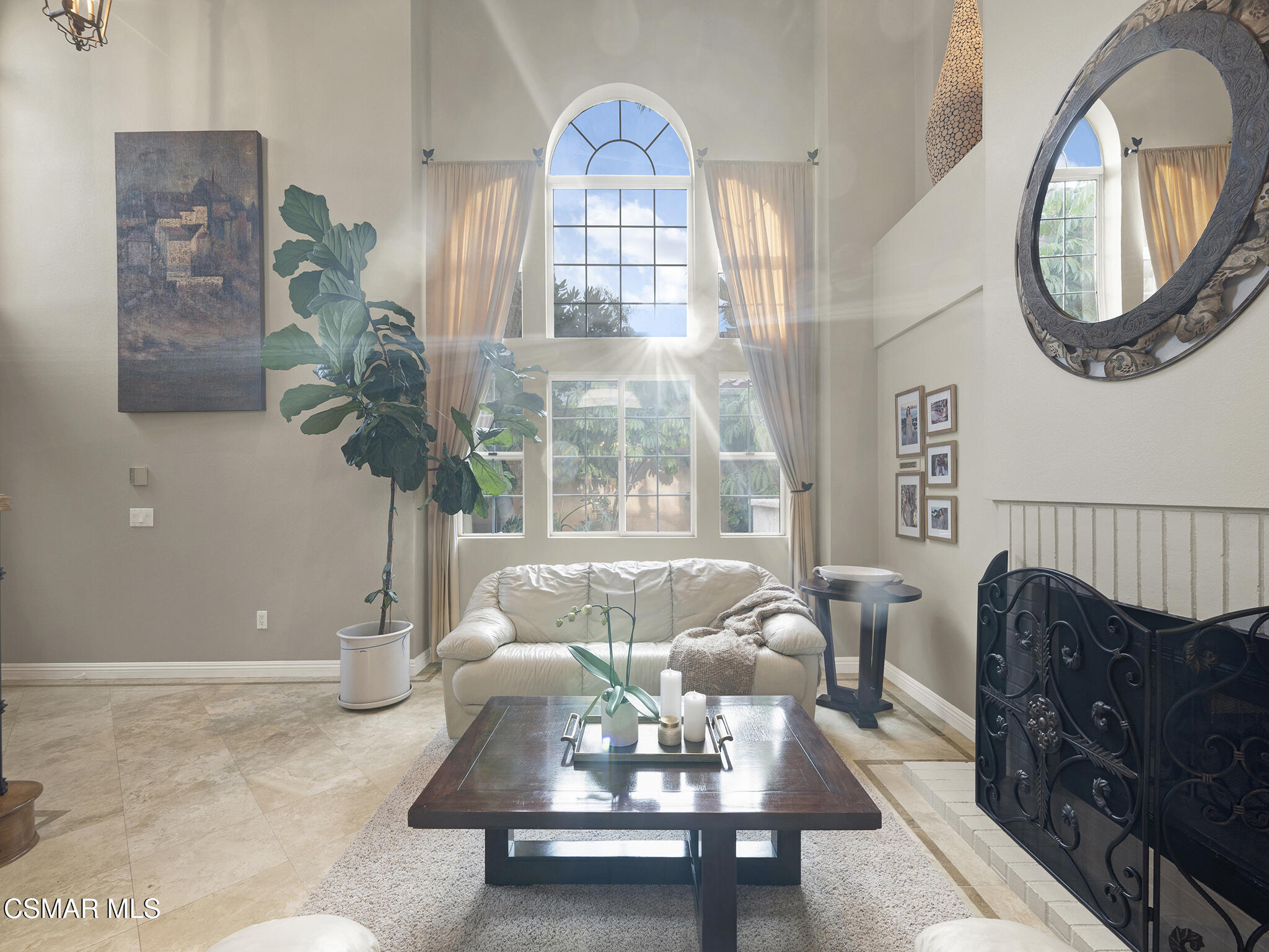 625 Sedgeworth Court Simi Valley, CA 93065 - Photo 8 of 44 a living room with furniture a window and a chandelier