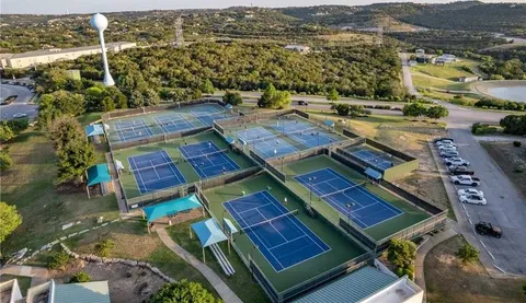 $385,000 | 156 World Of Tennis Square, Unit D167, Lakeway, TX 78738