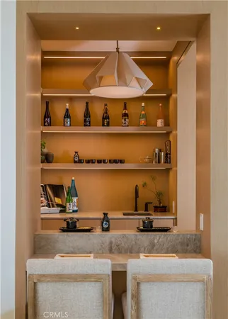 a kitchen with a sink and a stove