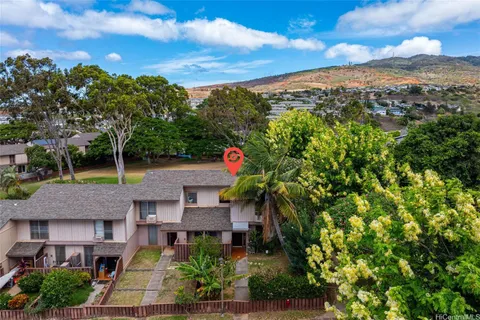 a house view with a garden space