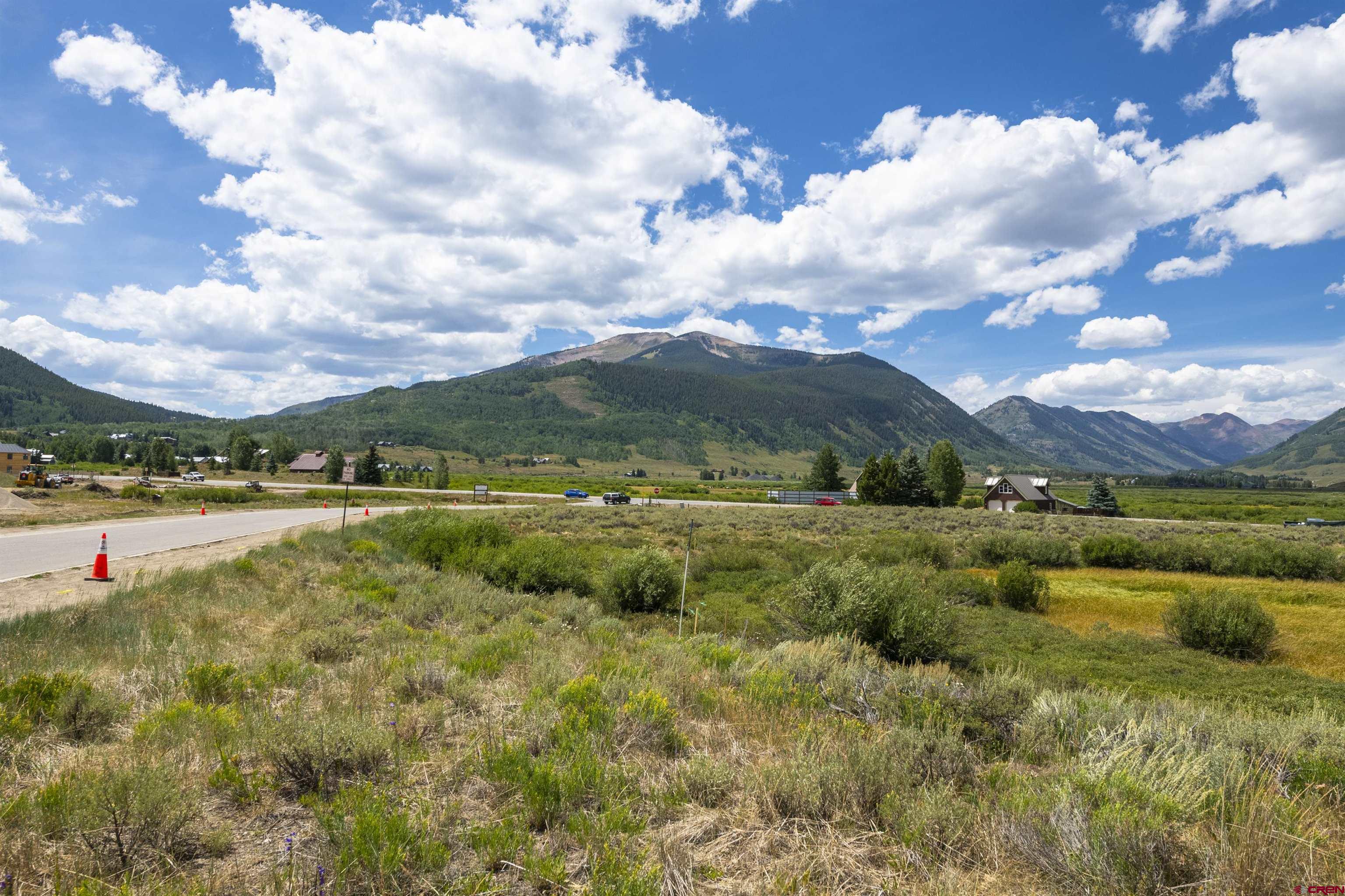 57 Augusta Drive Crested Butte, CO 81224 - Photo 8 of 33 a view of a lake with houses