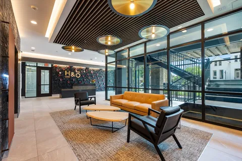 a outdoor living space with patio furniture and a potted plant