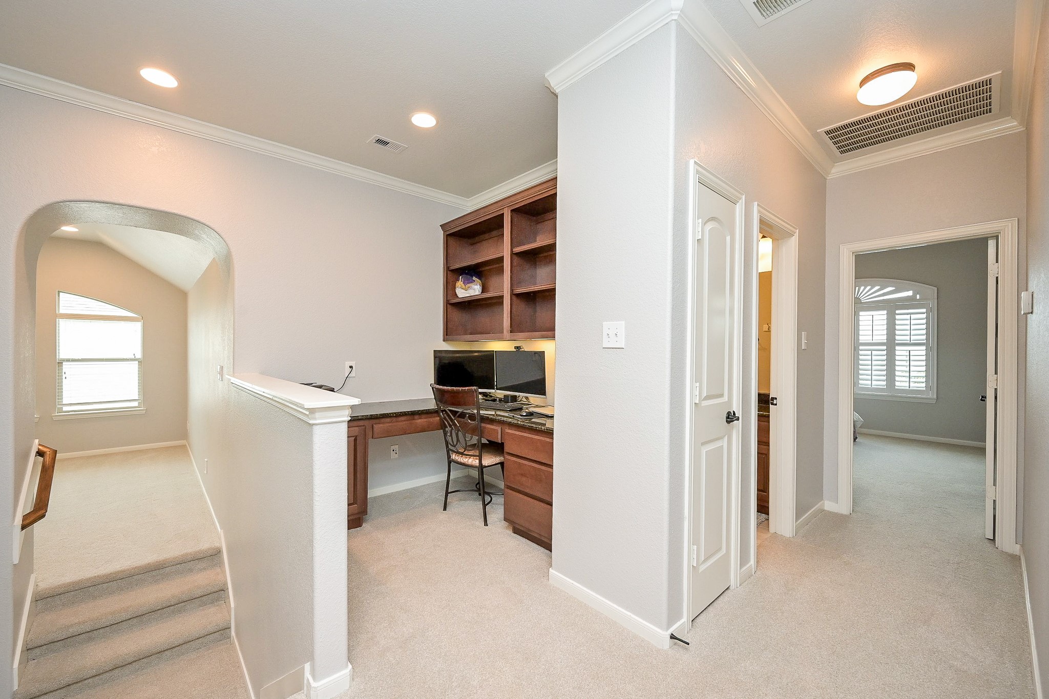 11 South Victoriana Circle Spring, TX 77389 - Photo 28 of 38 a view of a hallway with workspace and a living room
