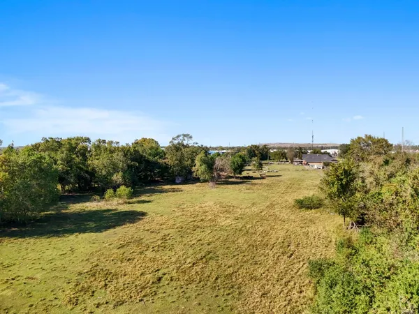 a view of a house with a ocean view