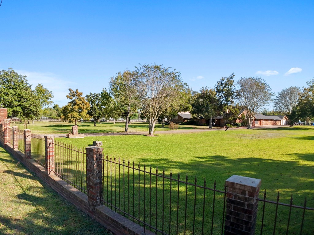 11318 Wallisville Road Houston, TX 77013 - Photo 21 of 42 a view of a garden and lake