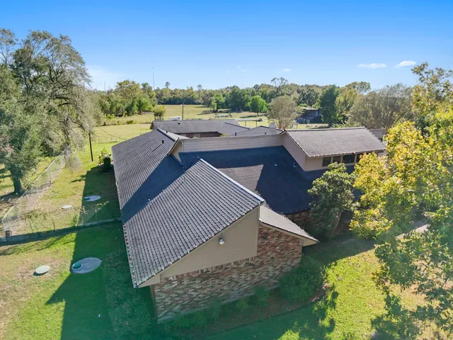 a view of a house with a ocean view