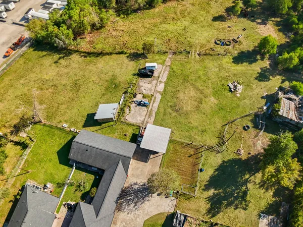 an aerial view of residential house with ocean view