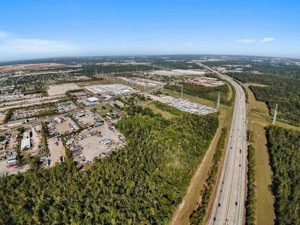 an aerial view of beach and ocean