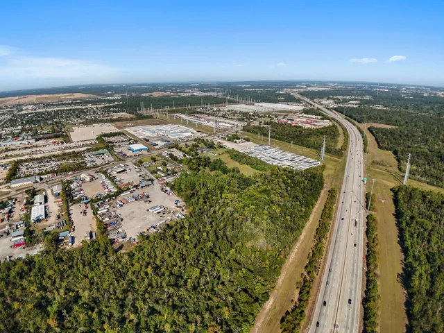 an aerial view of beach and ocean