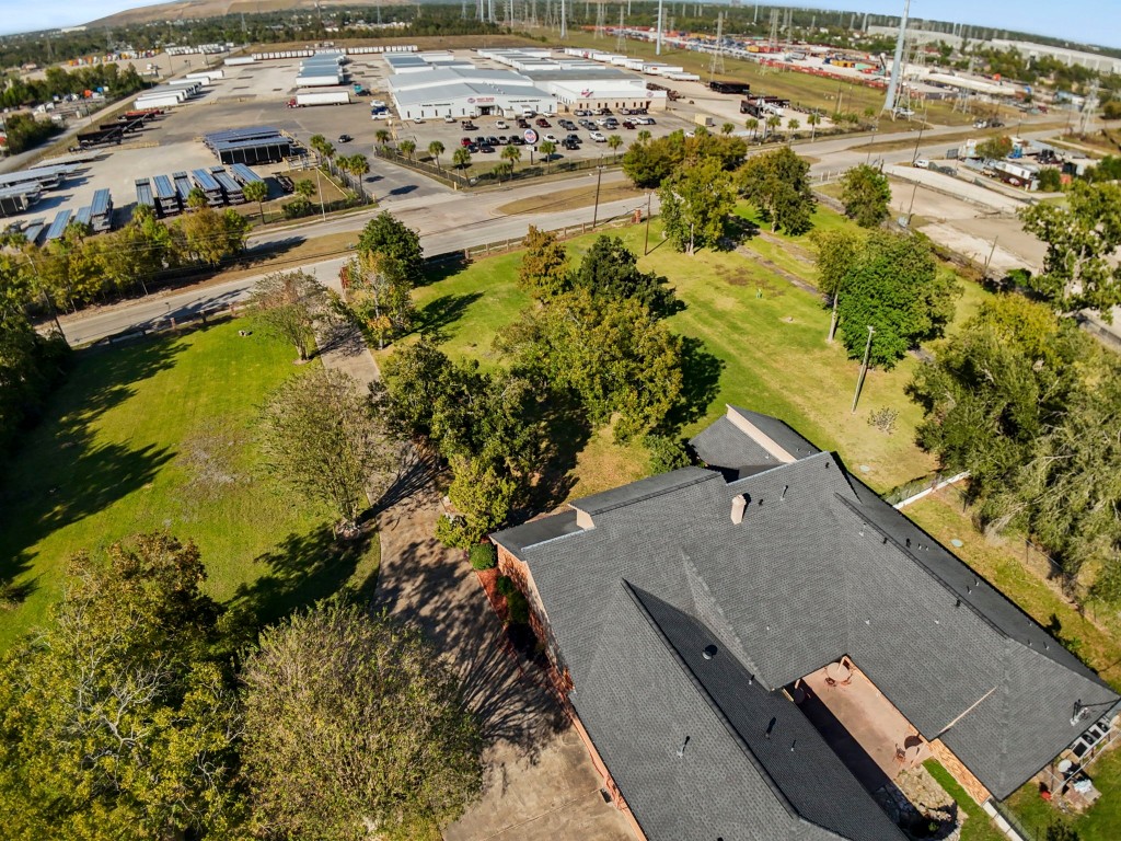 11318 Wallisville Road Houston, TX 77013 - Photo 36 of 42 an aerial view of residential houses with outdoor space