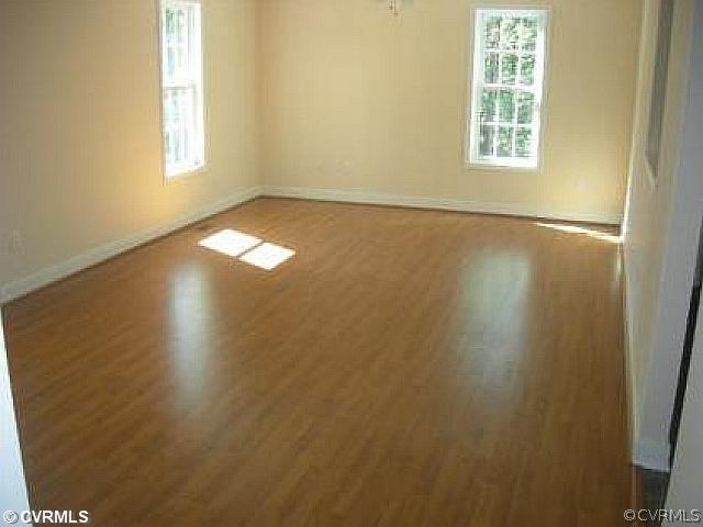 19 Winding Ridge Way Bumpass, VA 23024 - Photo 6 of 12 an empty room with windows