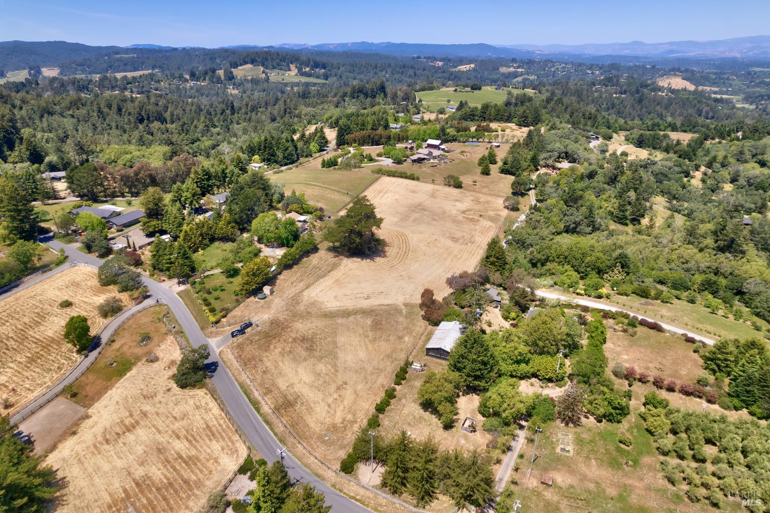 10700 Barnett Valley Road Sebastopol, CA 95472 - Photo 4 of 21 an aerial view of residential houses with outdoor space and trees