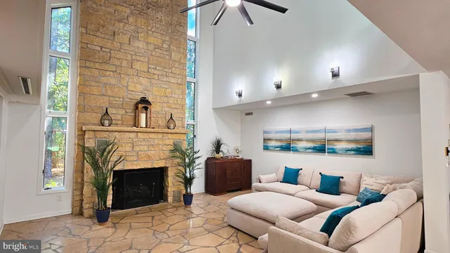 a kitchen with a sink a counter space cabinets and appliances