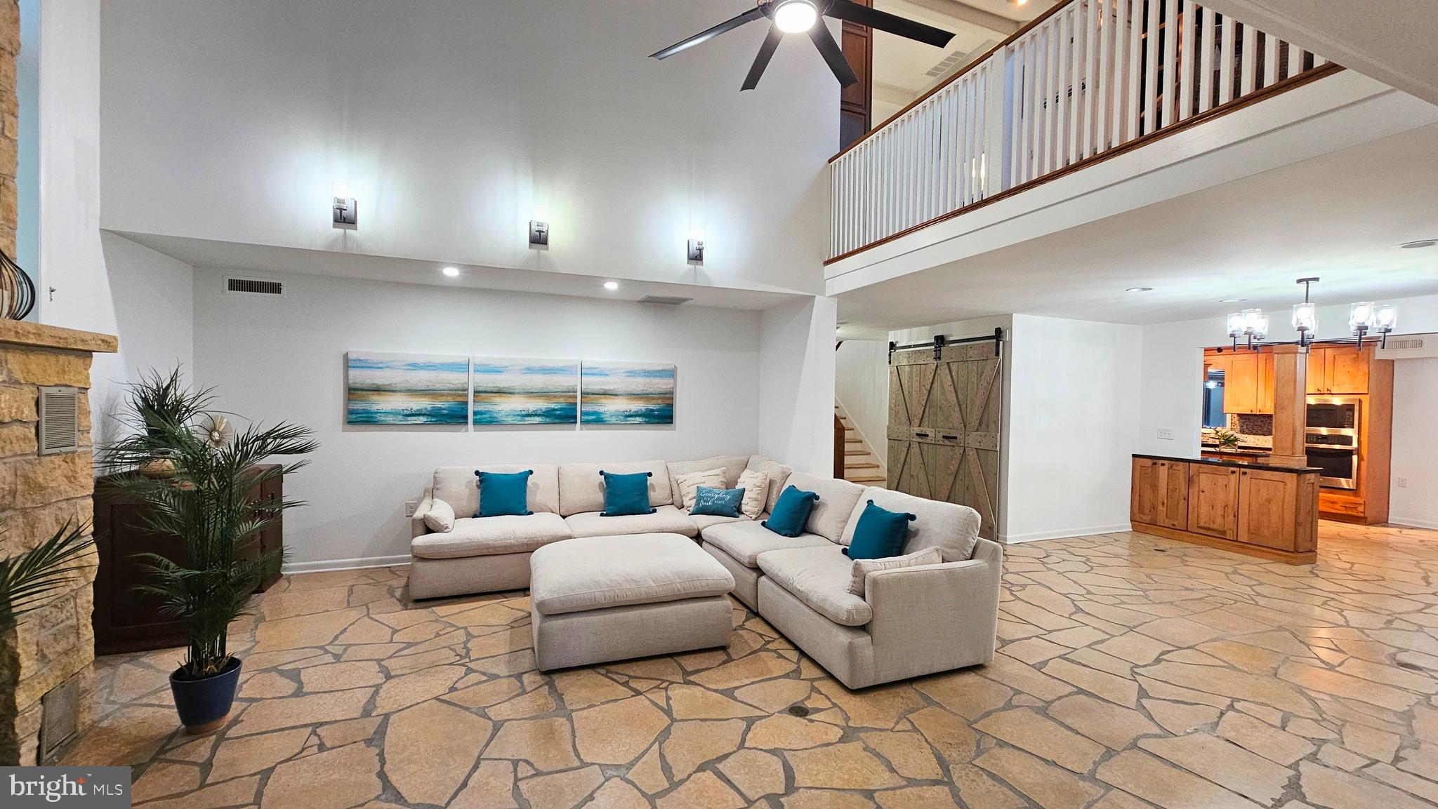 4419 Cooper Road Eden, MD 21822 - Photo 21 of 146 a living room with furniture and kitchen view