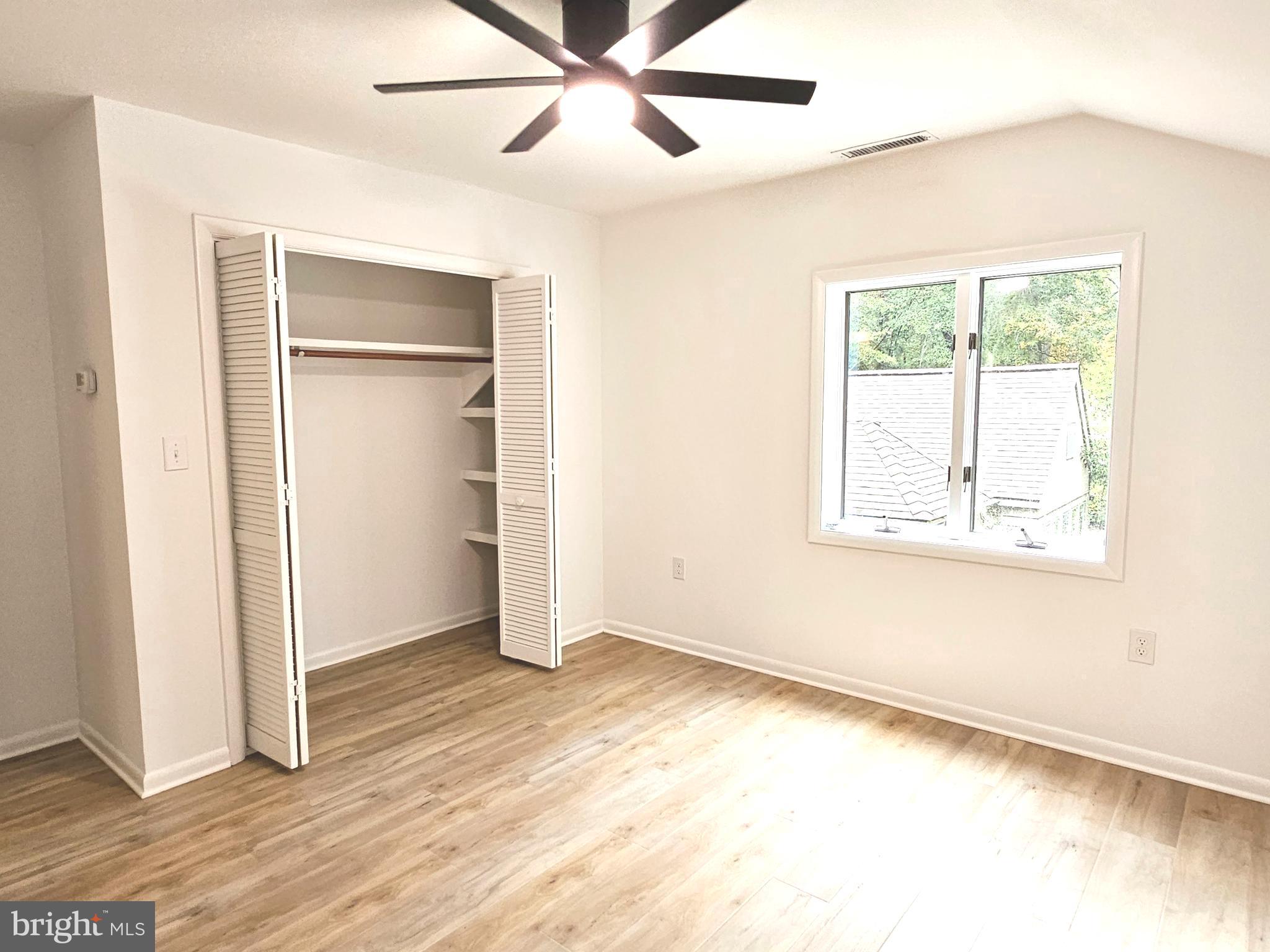 4419 Cooper Road Eden, MD 21822 - Photo 69 of 146 a view of an empty room with wooden floor and a window