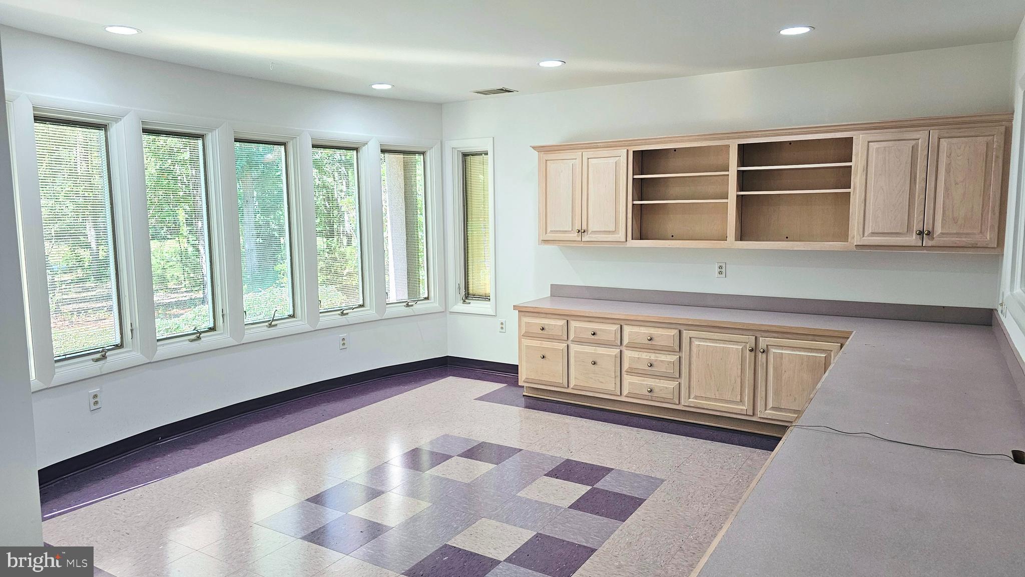 4419 Cooper Road Eden, MD 21822 - Photo 77 of 146 a view of an empty room with window and cabinet