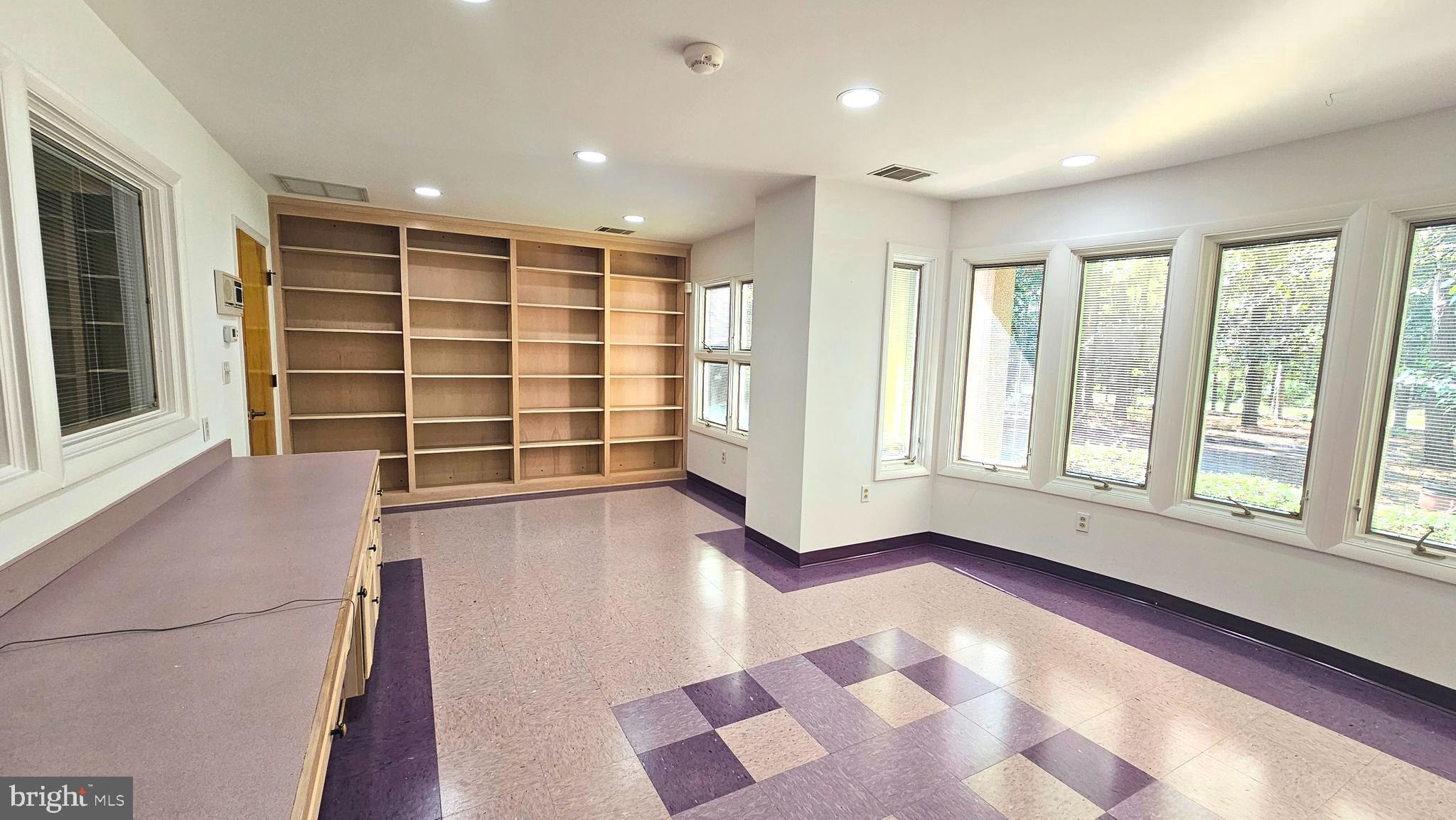 4419 Cooper Road Eden, MD 21822 - Photo 80 of 146 a view of an empty room with a window and wooden floor