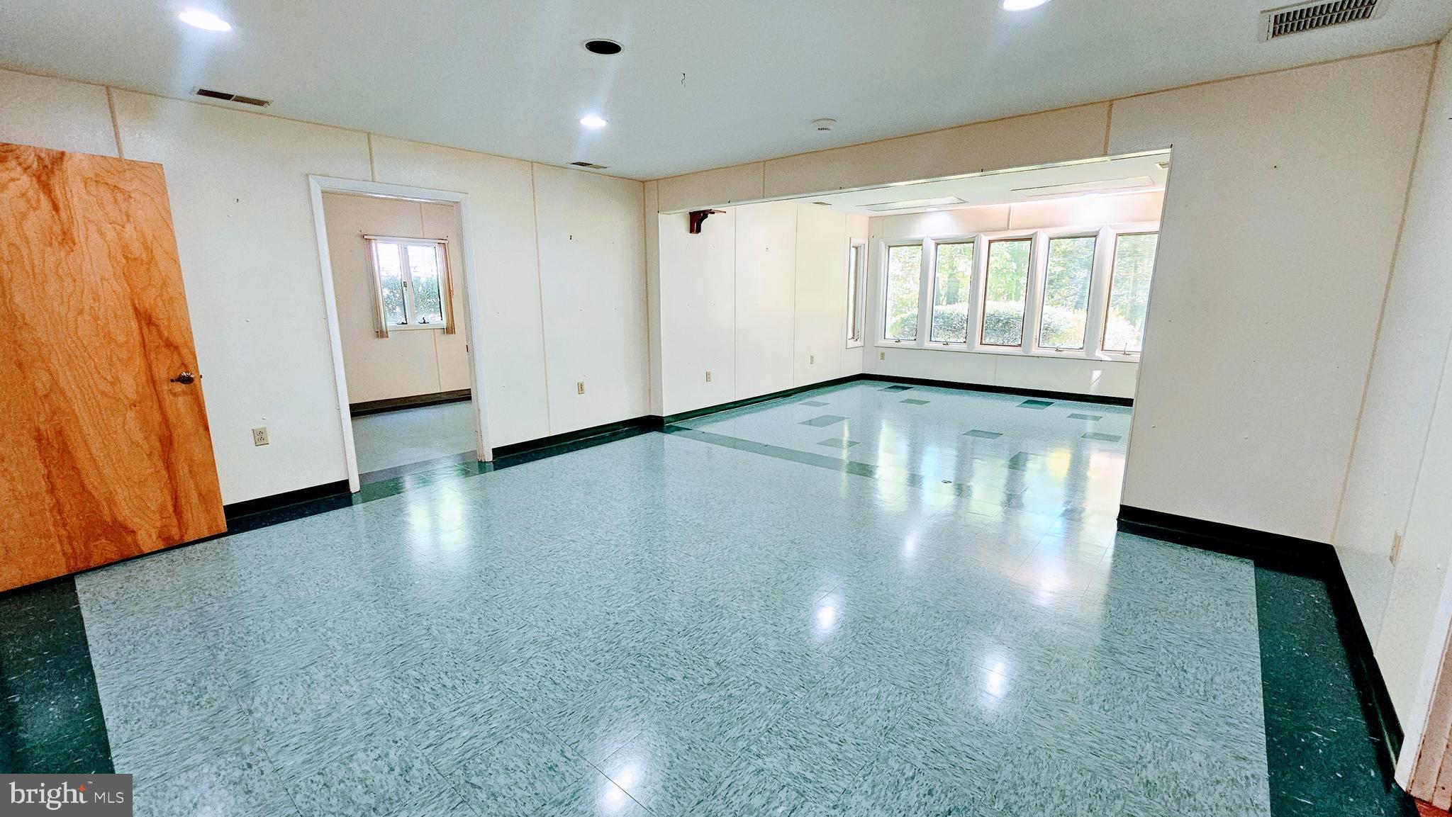 4419 Cooper Road Eden, MD 21822 - Photo 81 of 146 a view of empty room with wooden floor and fan