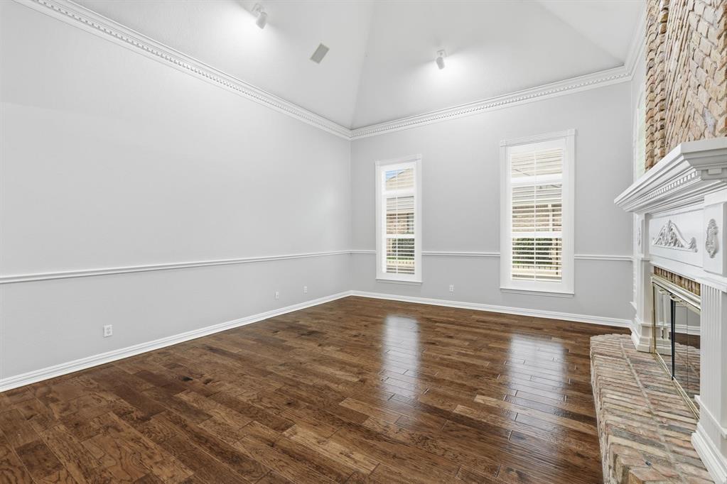 848 Birdsong Bedford, TX 76021 - Photo 19 of 40 an empty room with wooden floor and windows