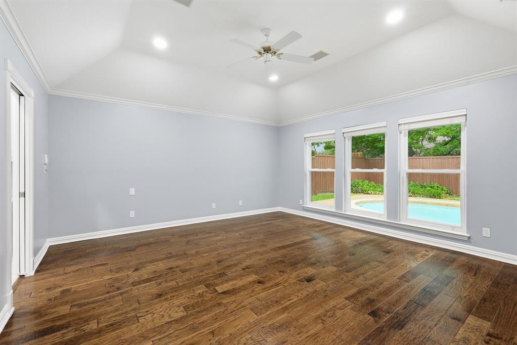 848 Birdsong Bedford, TX 76021 - Photo 21 of 40 an empty room with wooden floor and windows