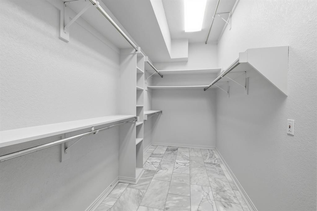 848 Birdsong Bedford, TX 76021 - Photo 25 of 40 a view of a room with racks on the wall