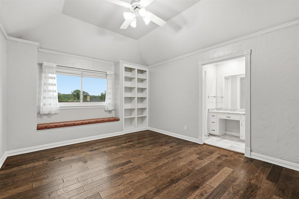 848 Birdsong Bedford, TX 76021 - Photo 29 of 40 a view of an empty room with a window and wooden floor