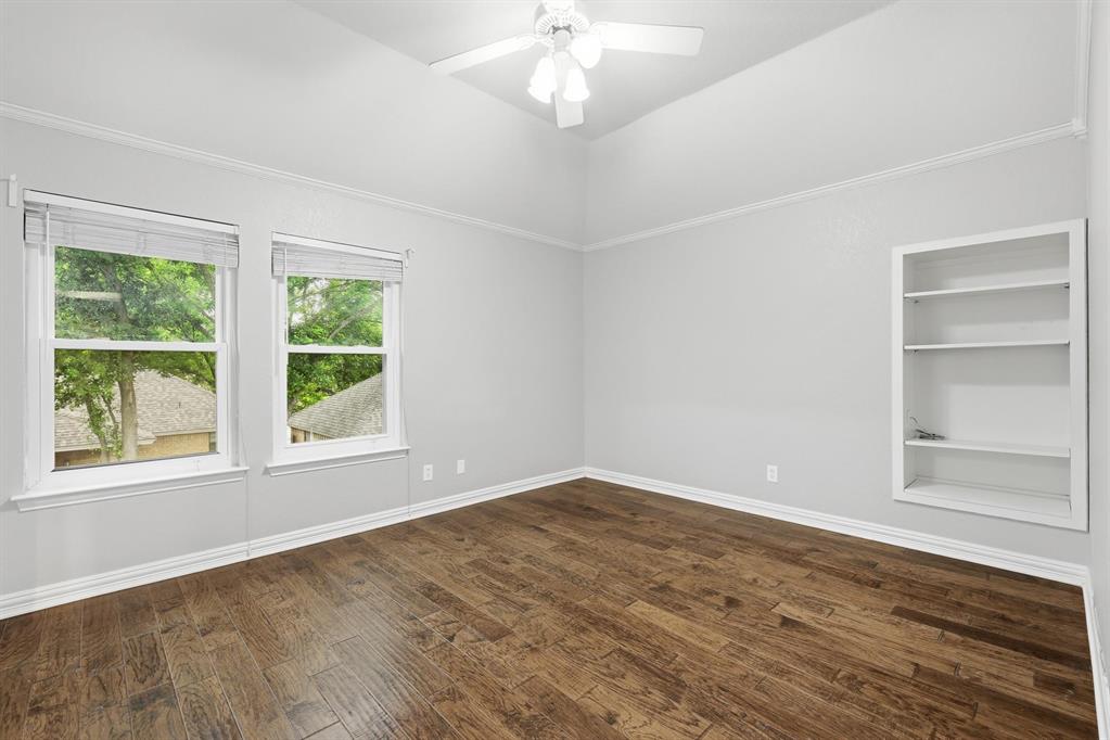 848 Birdsong Bedford, TX 76021 - Photo 35 of 40 wooden floor in an empty room with a window