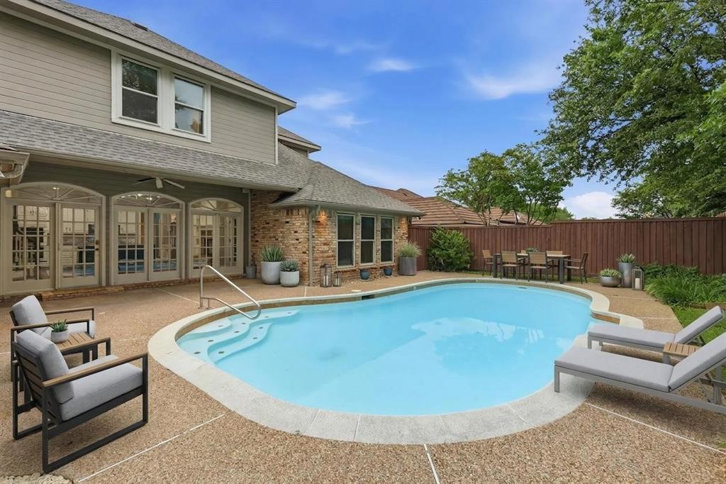 848 Birdsong Bedford, TX 76021 - Photo 39 of 40 a view of a house with swimming pool and furniture