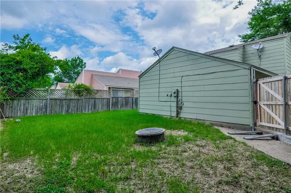 a view of a backyard with a garden