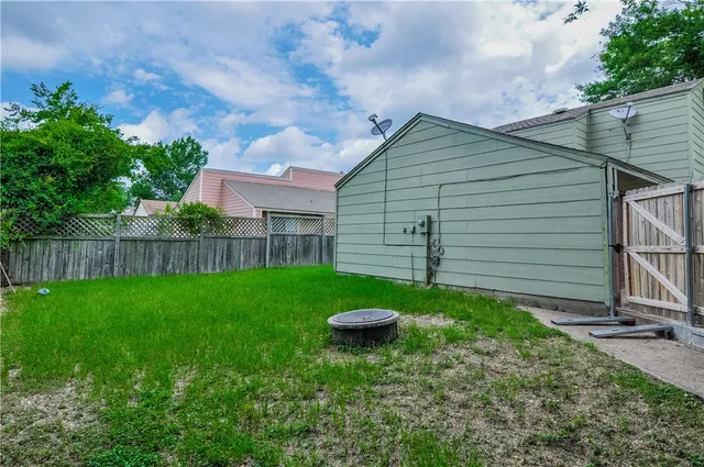 a view of a backyard with a garden