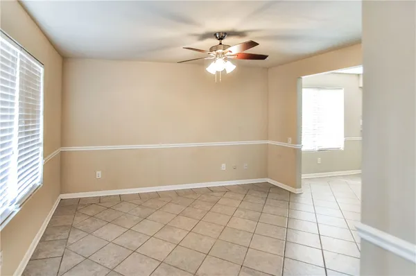 a view of an empty room and window