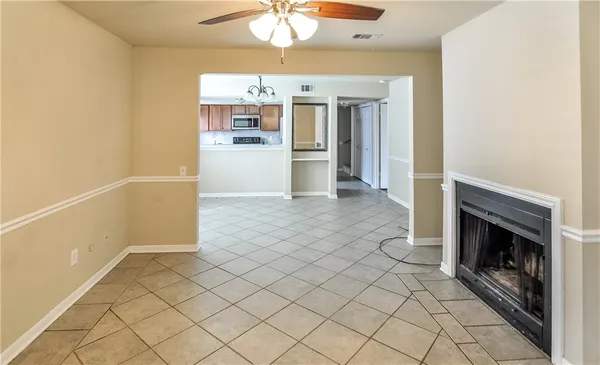 a view of a kitchen with furniture and a fireplace