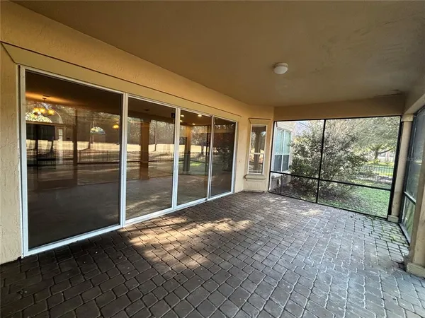a view of porch with large windows