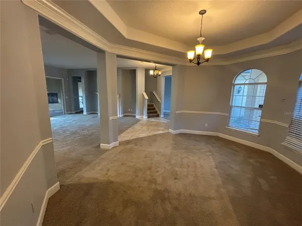 a bathroom with a toilet and a bathtub