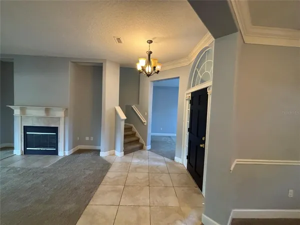 a view of a bedroom with wooden floor & closet area