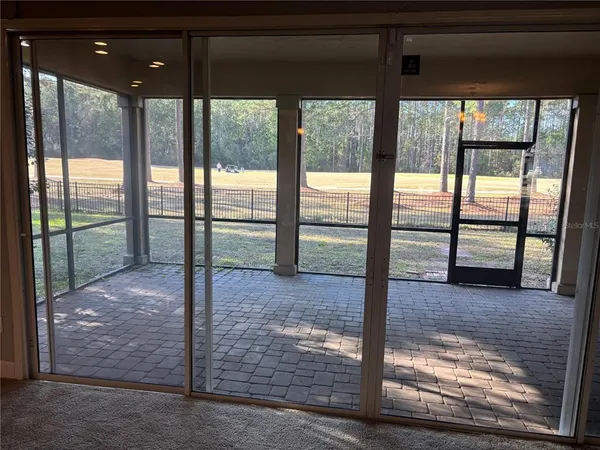 a view of porch with a floor to ceiling window