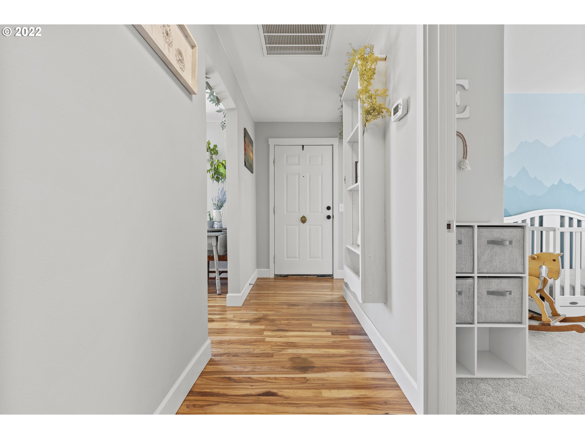 1174 Southwest Maple Street Dallas, OR 97338 - Photo 16 of 32 a view of a hallway with wooden floor and entryway