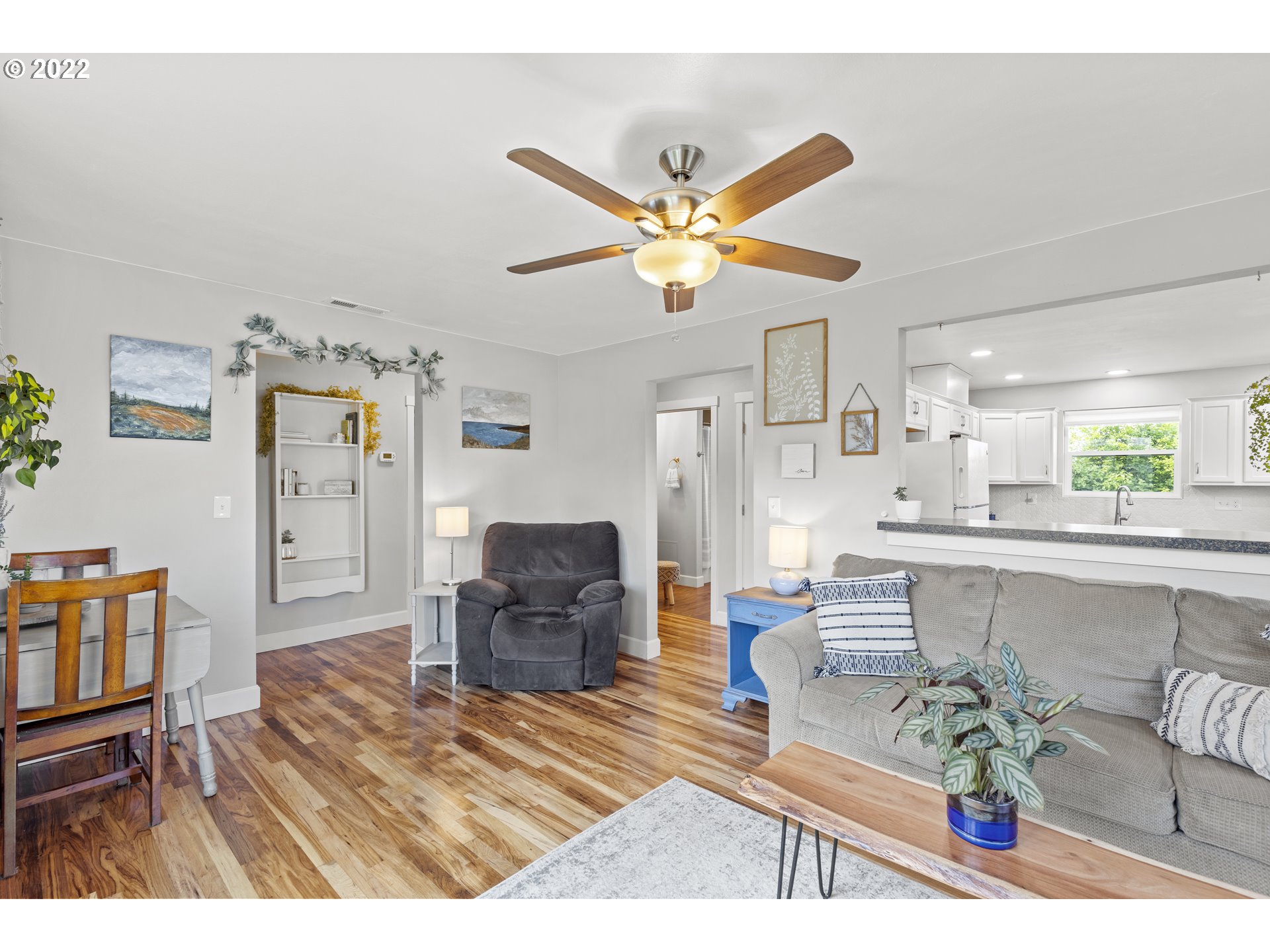 1174 Southwest Maple Street Dallas, OR 97338 - Photo 6 of 32 a living room with furniture and kitchen view
