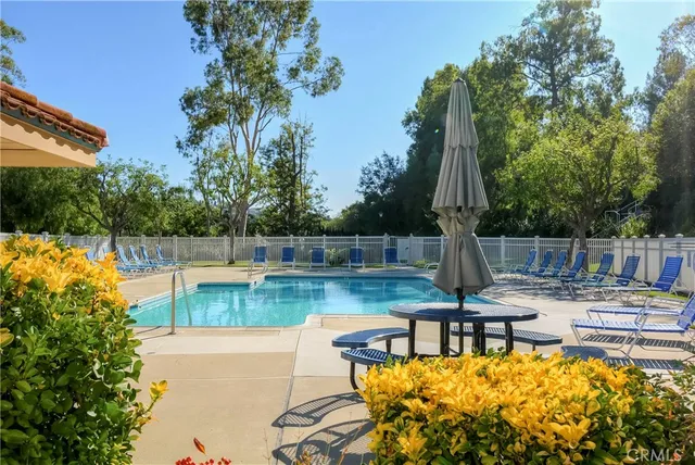 a view of houses with an outdoor space and seating