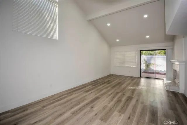 a kitchen with a sink and a stove top oven