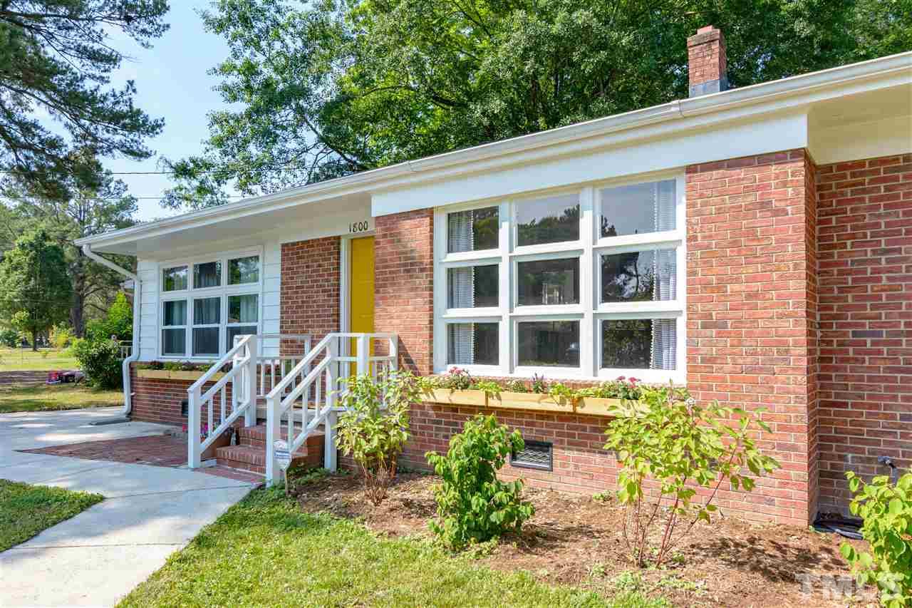 1800 Charles Raleigh, NC 27610 - Photo 2 of 28 a front view of a house with garden and porch