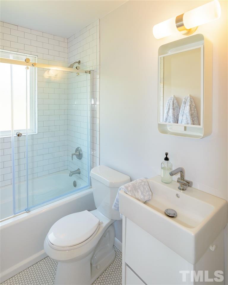 1800 Charles Raleigh, NC 27610 - Photo 20 of 28 a bathroom with a sink toilet and shower