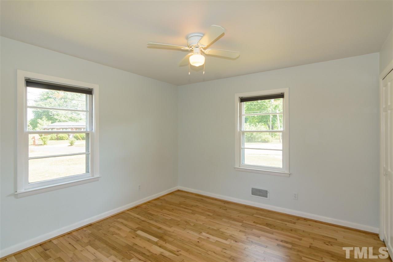 1800 Charles Raleigh, NC 27610 - Photo 23 of 28 a view of an empty room with wooden floor and a window